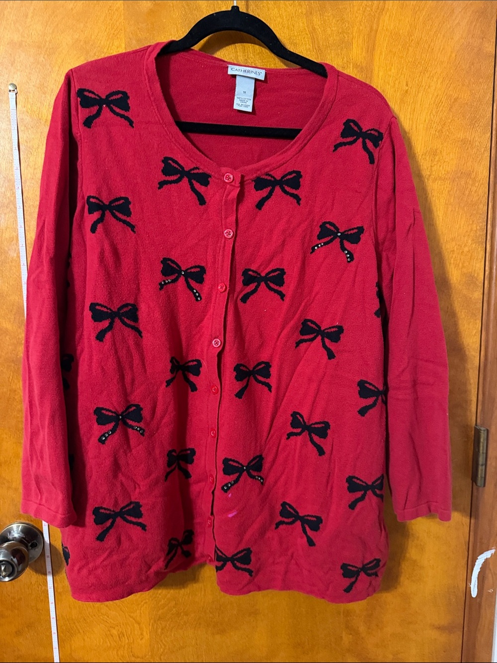 Catherines Red Cardigan with Black Bow Motif